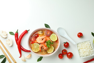 Tom yum soup and ingredients on white background