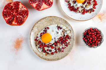 Traditional Azerbaijan cuisine pomegranate seeds with egg narnumru or nar numru.
