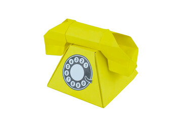 One yellow phone made with small craft paper and nicely placed on a paper background