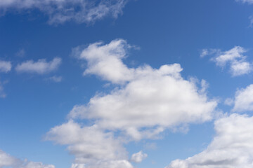 White, Fluffy Clouds In Blue Sky. Background From Clouds.