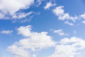 Naklejka na ściany i meble White, Fluffy Clouds In Blue Sky. Background From Clouds.