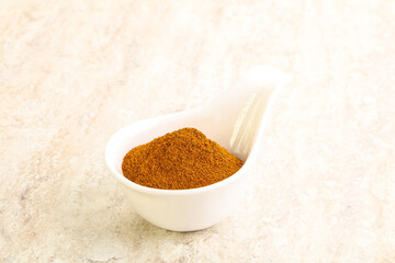 Dry Paprika powder in the bowl
