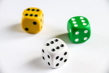Three colorful dices isolated on white background