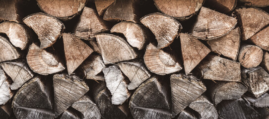 Wood pile background texture. Horizontal banner