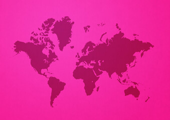 World map on pink wall background
