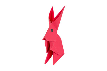 Pink little rabbit made with small craft paper and nicely placed on a paper background