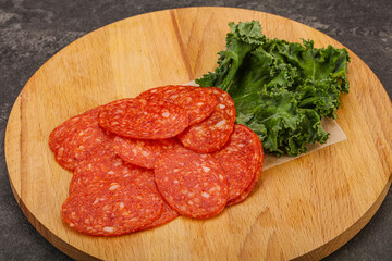 Italian spycy pepperoni sausage slices