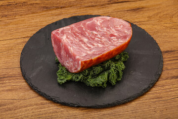 Beef ham piece over board