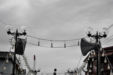 speaker and light lamps on the Electric pole