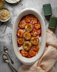 Roasted plums with almond and thyme