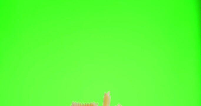 Pasta flies up and down on a green chroma key background. Blackmagic Ursa Pro G2, 300 fps.