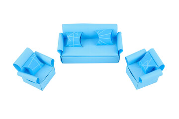 Some sofa made with small craft paper and nicely placed on a paper background