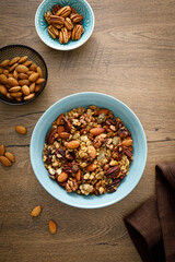 Granola, muesli with nuts for breakfast in a bowl, healthy food, diet.