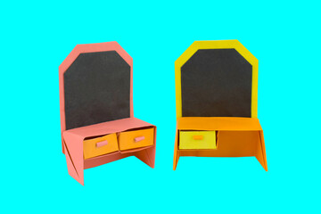 Two desk made with small craft paper and nicely placed on a paper background
