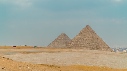 Fototapeta na wymiar Panorama of the pyramids in Giza, Egypt on a foggy day
