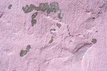 pink old shabby plaster on the wall