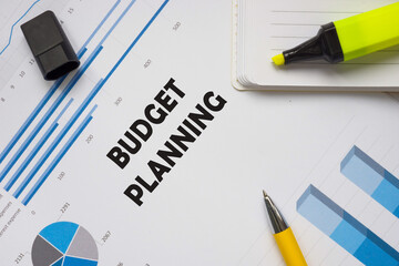 Financial concept meaning BUDGET PLANNING with sign on the piece of paper.