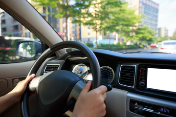 Driving car on city street