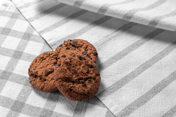 homemade cookies on white striped and checkered kitchen towels