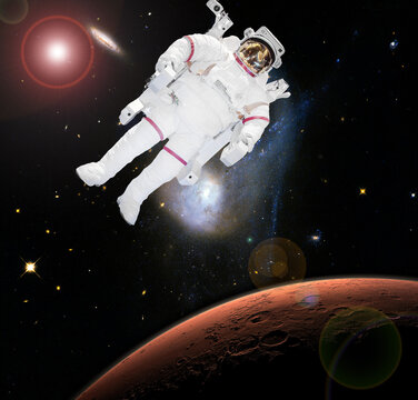 Astronaut and Mars. Deeps space. The elements of this image furnished by NASA.