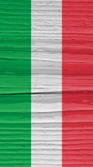 The flag of Italy on dry wooden surface, cracked with age. It seems to flutter in the wind. Vertical mobile phone wallpaper or background with Italian national symbols. Annual rings of old wood