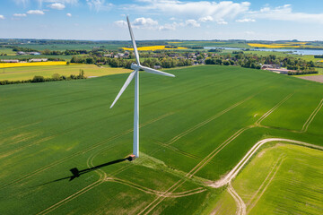 A wind turbine that produces electricity, built on a field in Skanderborg, Denmark

