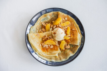 pancakes jam scoop ice cream orange slices