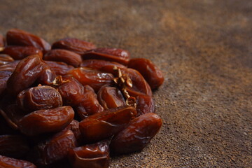 dates fruit in brown background 