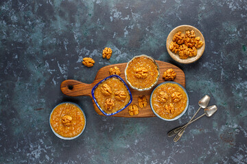 Traditional Azerbaijan,Indian,Turkish sweet dessert halva with walnuts on top.