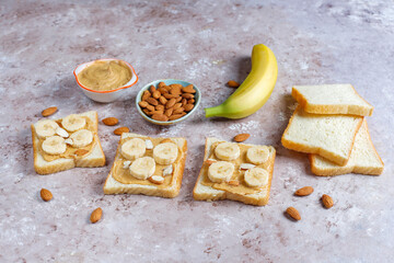 Sandwich with peanut butter and banana slices.