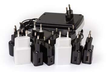 Different chargers of portable electronic devices with AC Europlugs