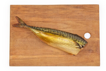 Top view of smoked mackerel without head on cutting board
