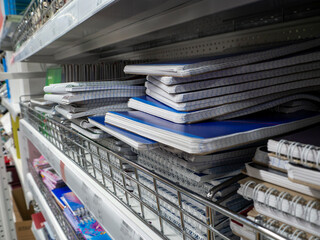 On the shelves are stacks of notebooks, notepads, sketchbooks.  Stationery for study, notes,...