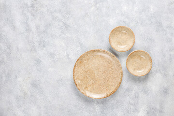Different ceramic empty plates and bowls.