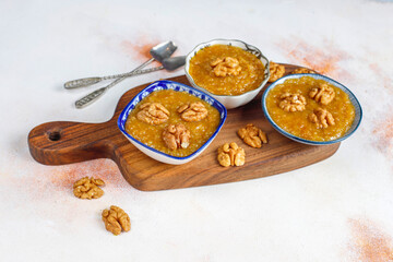 Traditional Azerbaijan,Indian,Turkish sweet dessert halva with walnuts on top.
