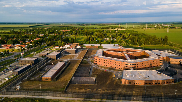 Prison. Aerial view of penitentiary prison and detention center near city.