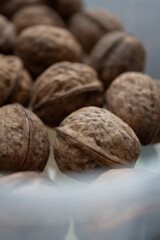 Close up of walnuts on a kitchen table in a container