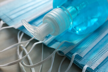 Protective medical masks from Covid-19 and hygienic protective gel. Hygiene concept during the Covid-19 epidemic