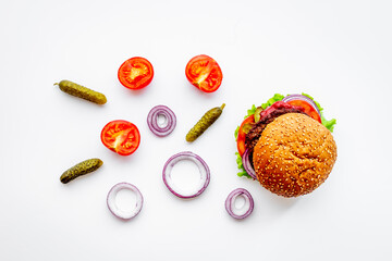 Homemade burgers with pickles and fries. Top view