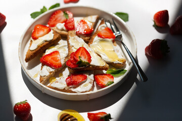 Healthy food breakfast strawberry toast with butter cream