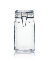Empty glass jar isolated on white.