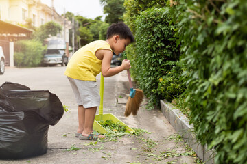 Boy cleaning the area of the house