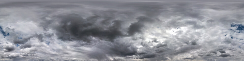 blue sky with beautiful dark clouds before storm. Seamless hdri panorama 360 degrees angle view...