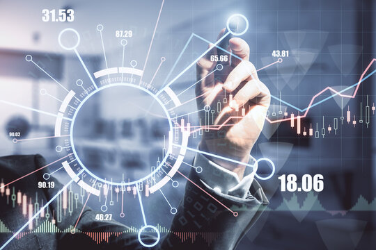 Forex market and blockchain technology analysis concept with trader hand with pan on digital board with financial chart diagram and graphs and technological circle with indicators and quotes.