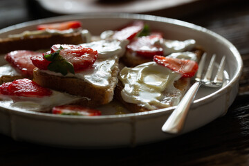 Healthy food breakfast strawberry toast with butter cream
