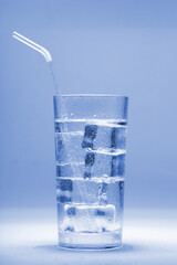 Clear water with ice in a glass