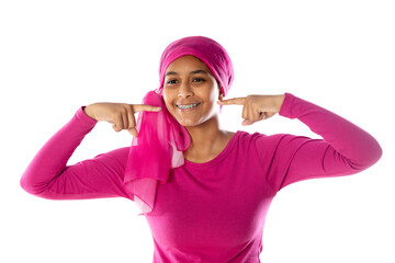 Young beautiful African woman wearing pink headscarf