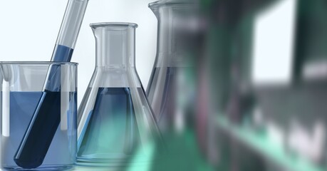 Composition of laboratory test tube and beakers with blue liquid and copy space
