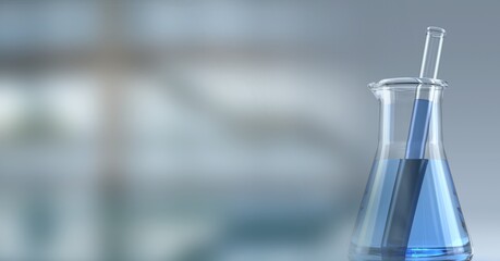 Composition of conical flask of blue liquid and stirrer, with blurred copy space