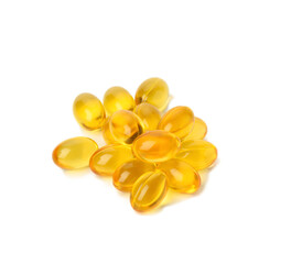 scattered oval tablets with fish oil, omega 3 on a white background